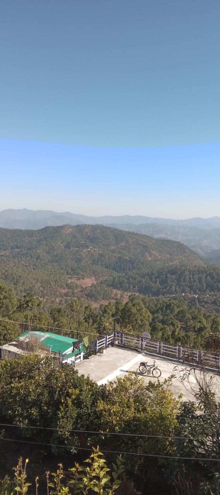 The Real Place Almora Bilik gambar